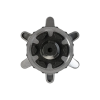 Top view of replaceable golf spike on a white background