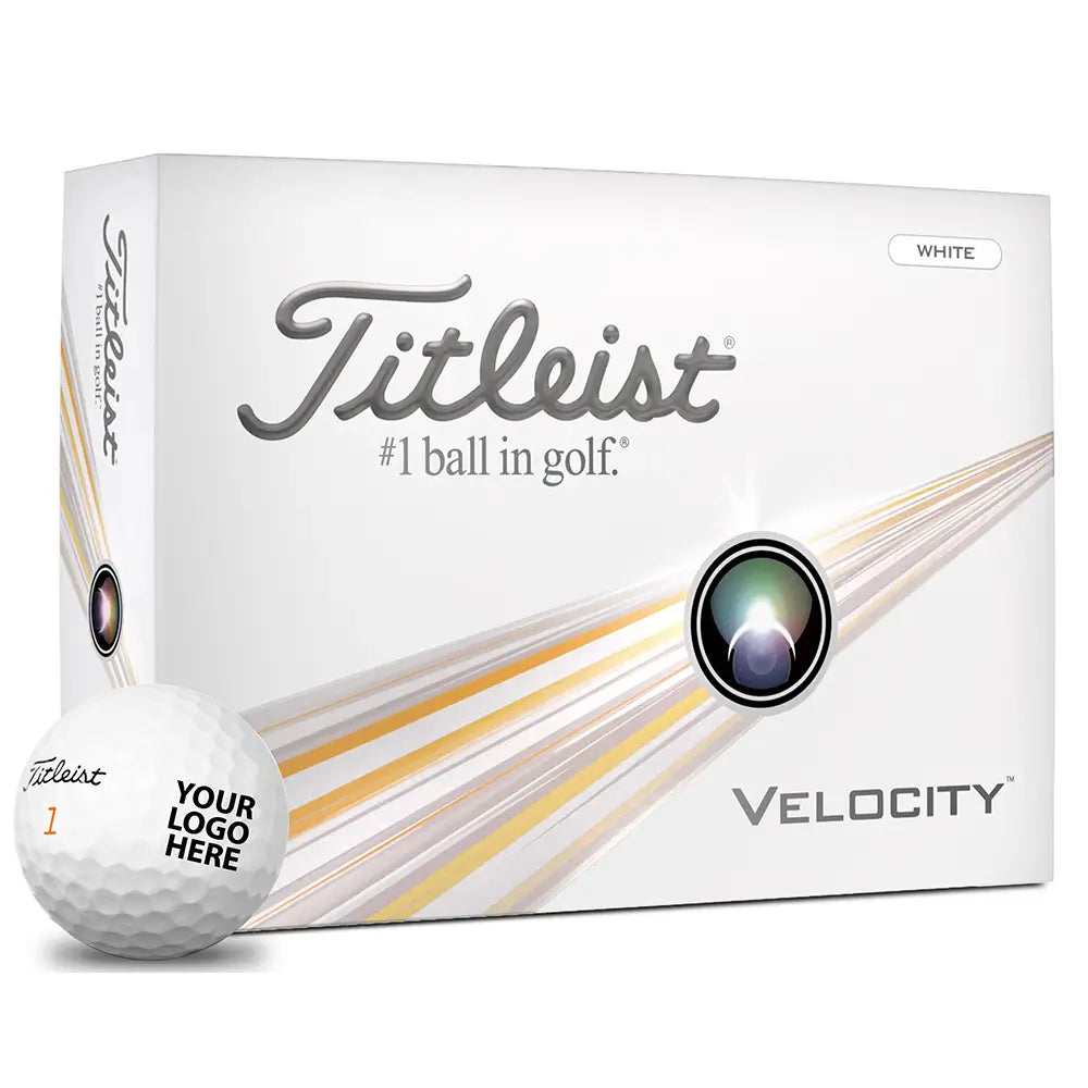 Titleist Velocity golf ball box with a golf ball in front on a white background