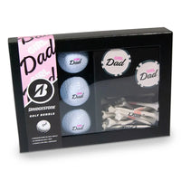 Golf bundle set with golf balls and tees in a gift box, featuring 'Girl Dad' labels.