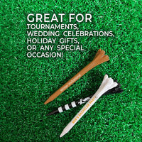 Three 2 3/4" Zarma® FLYtee® Personalized / Custom Golf Tees on green turf. Showing they are great for tournaments, celebrations and gifts.