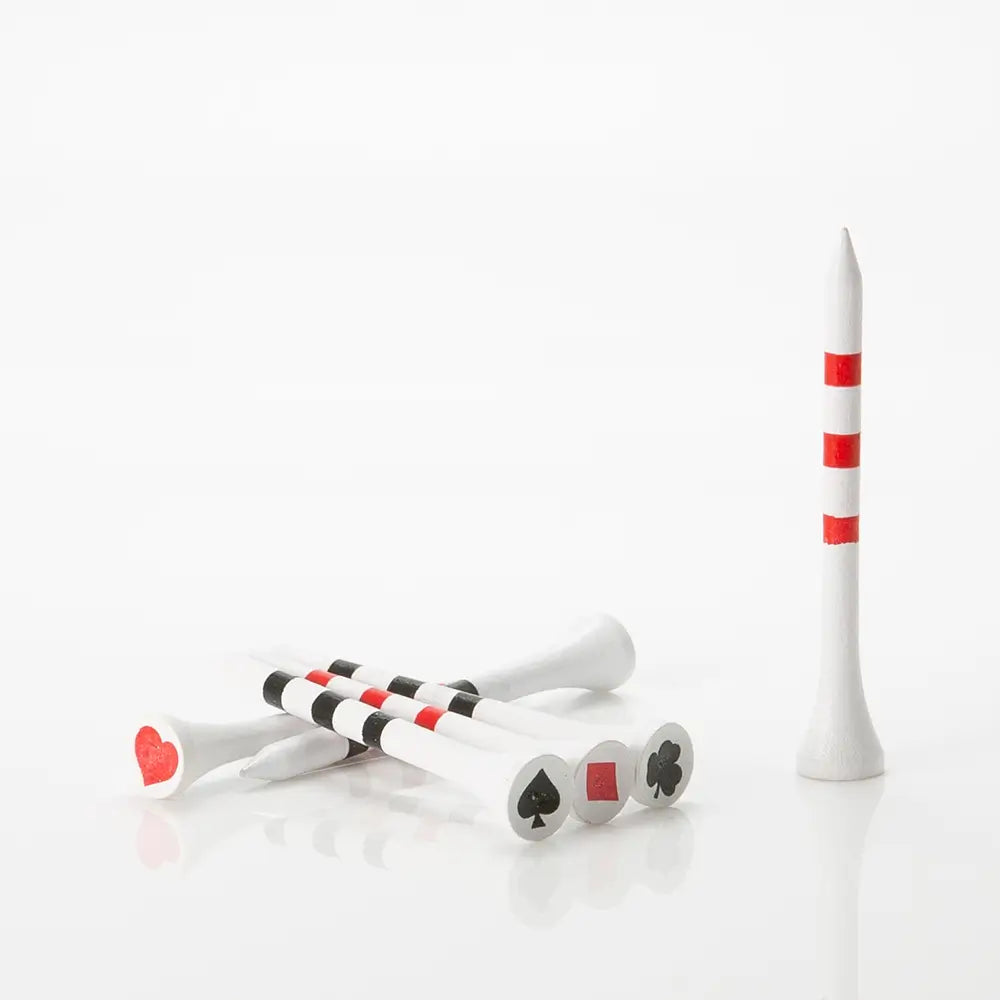 Golf tees with playing card suits and a white and red striped tee on a white background