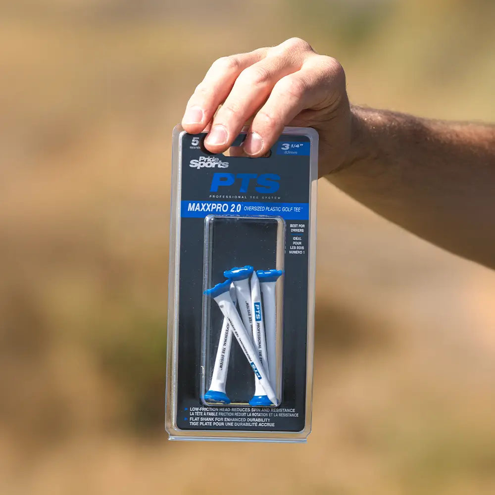 Person holding the PTS® 3-1/4 MaxxPro 2.0 Tees packaging.