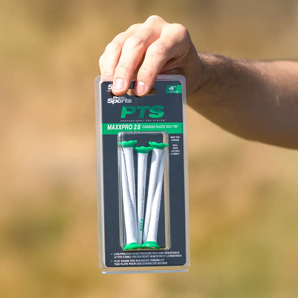 Person holding the PTS® 4 MaxxPro 2.0 Tees packaging.