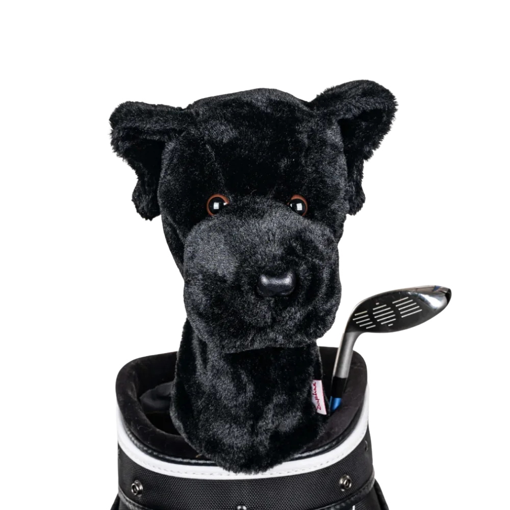 A plush dog headcover peeks out from a golf bag, featuring a fluffy design.