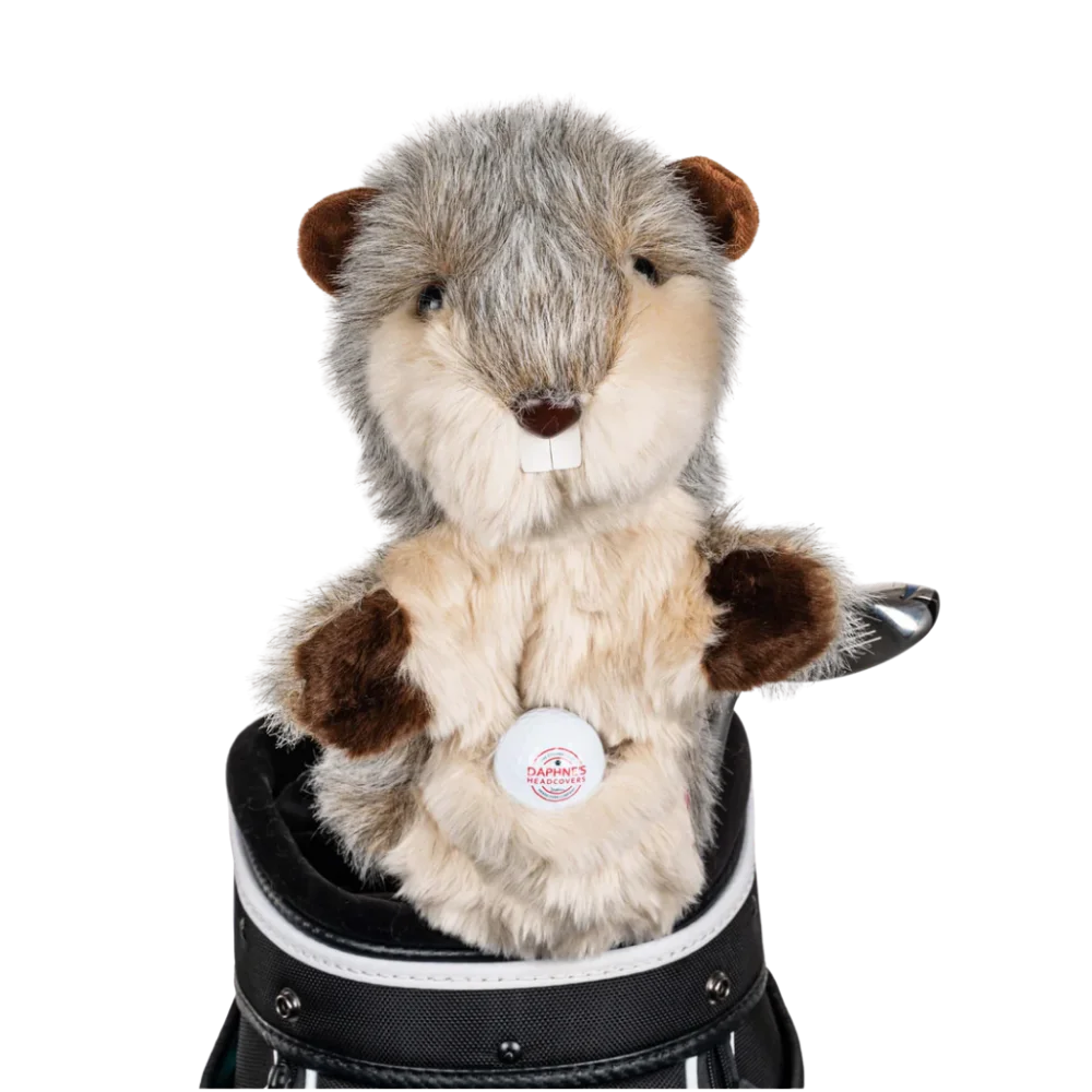 A gopher-shaped golf club head cover sitting in a golf bag, with a club peeking out.