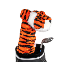 A tiger-shaped golf club head cover sitting in a golf bag, with a club peeking out.