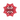 Bottom view of red Pulsar golf spike on a white background