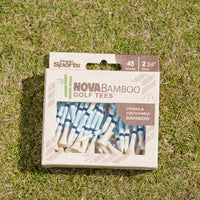 Nova bamboo blue striped packaging laying on green turf. 