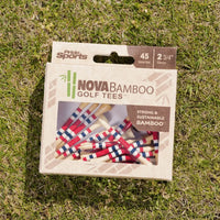 Nova bamboo red and blue striped packaging laying on green turf. 
