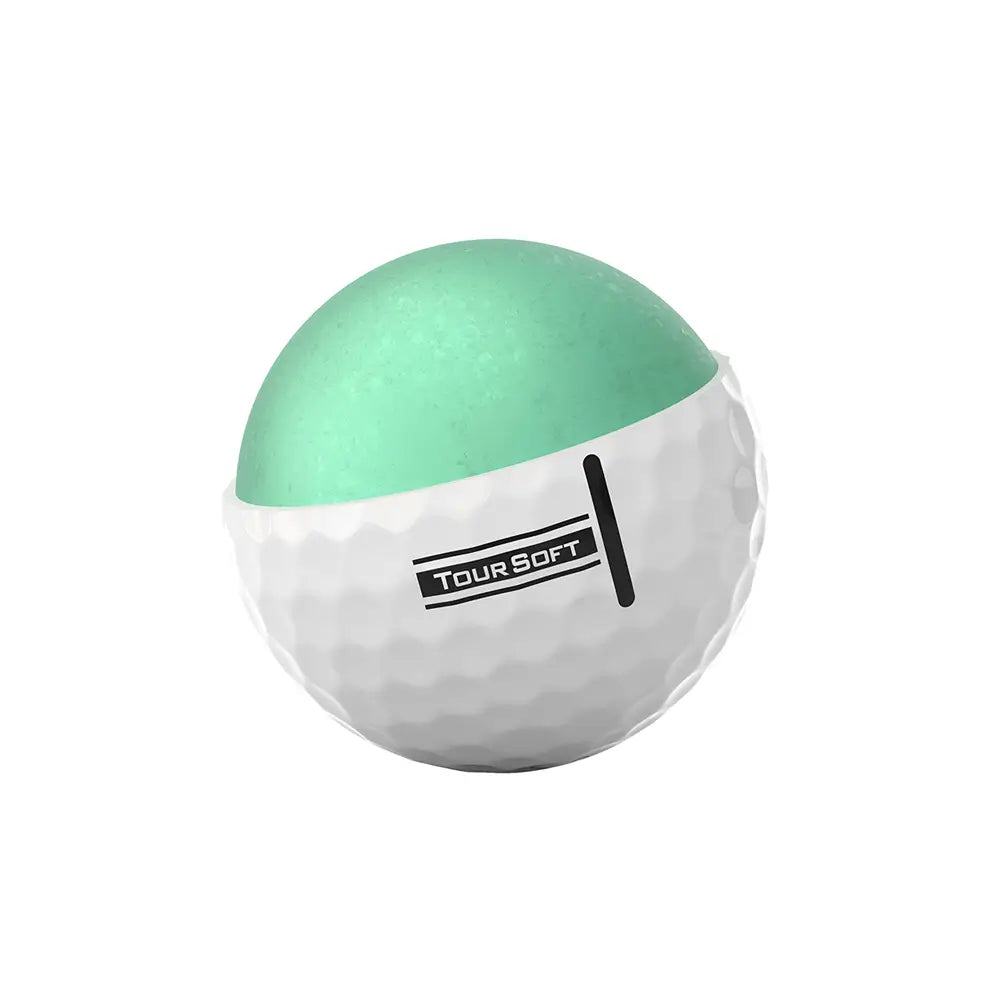 White Titleist Tour Soft golf ball cut away to show green inside and white bottom on a white background