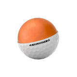 White Tiltleist golf ball cut away with orange inside being shown on a white background