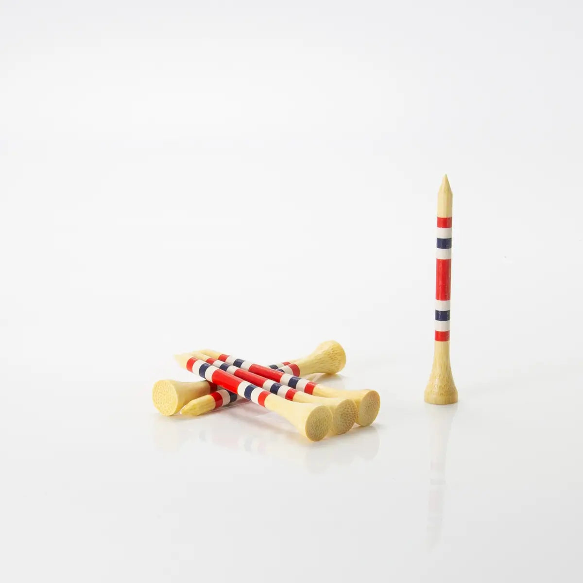 Six Nova Bamboo - Red/White/Blue tees stacked on one another. 