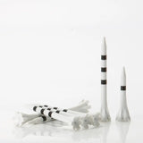 White golf tees with black stripes on a white background