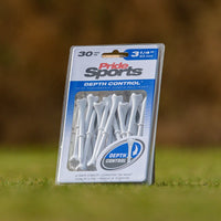 A pack of 30 pride sports white plastic golf tees with depth control feature, measuring 3 1/4 inches, standing on a grassy terrain.