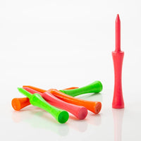 Set of neon mix step golf tees on a white background