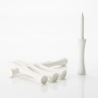 Set of wooden white golf tees on a white background