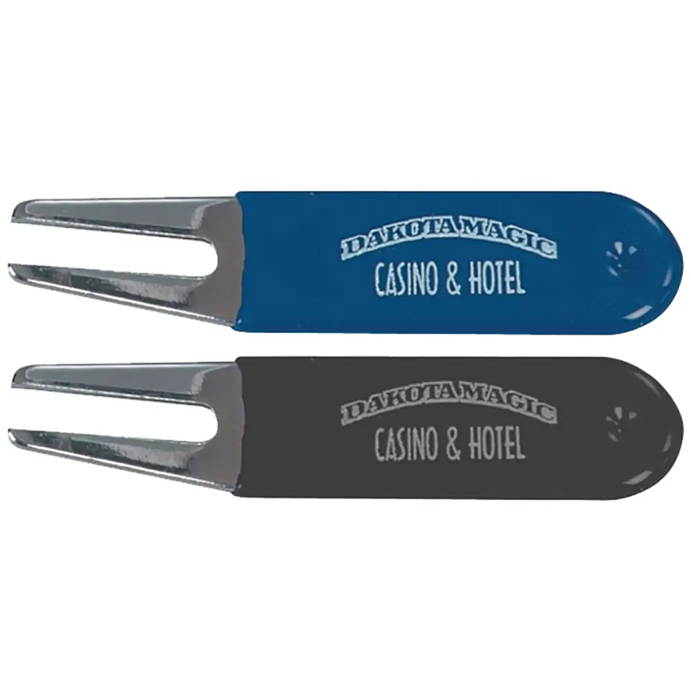 One blue and one black golf divot tools with 'Dakota Magic Casino & Hotel' branding on a white background.