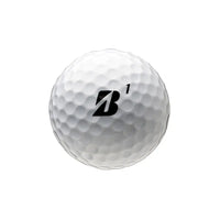 White Bridgestone Precept Power Drive golf ball with a black 'B' logo on a white background