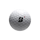 Bridgestone Tour B X golf ball with a black 'B' Bridgestone logo on a white background