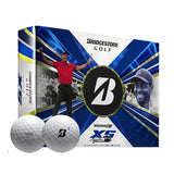 Bridgestone Tour B XS golf ball packaging with Tiger Woods celebrating and the Bridgestone logo.