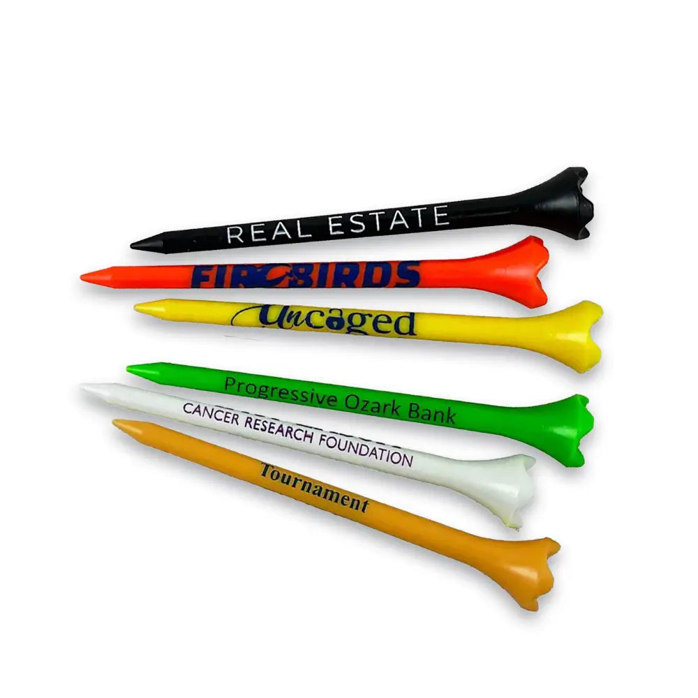 Six custom pride performance golf tees with different imprinted text on them. 