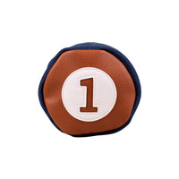 Top view of the Honors Collection barrel driver headcover's brown leather cap with white number 1 patch.