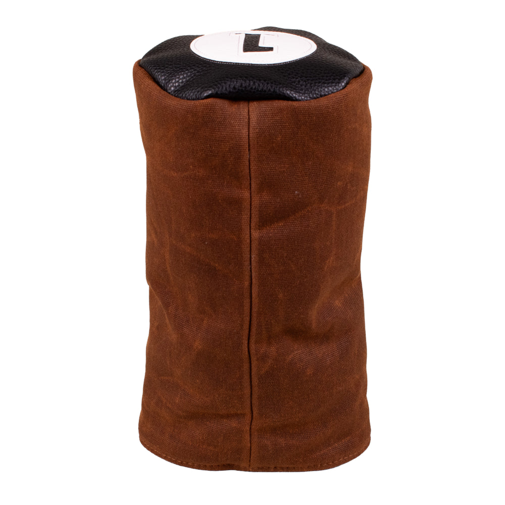 Side view of the Honors Collection brown canvas barrel driver headcover with black leather top and number 1 patch.
