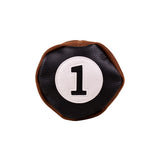 Top view of the Honors Collection barrel driver headcover's black leather cap with white number 1 patch.
