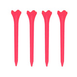 Four pink golf tees on a white background