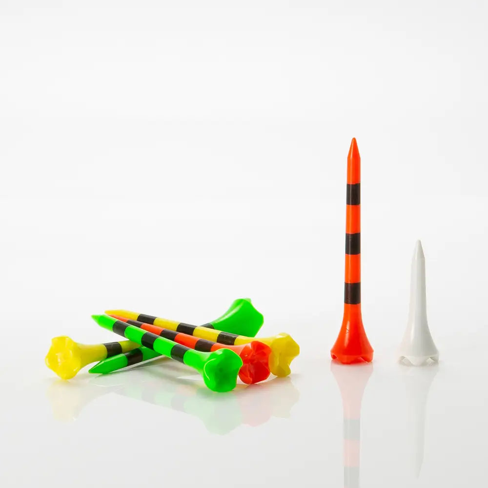 Colorful golf tees on a white background
