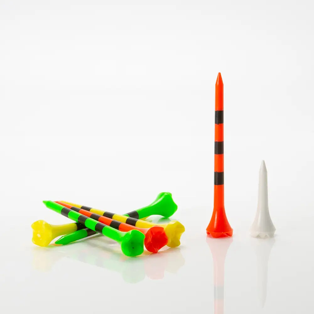 Colorful golf tees on a white background