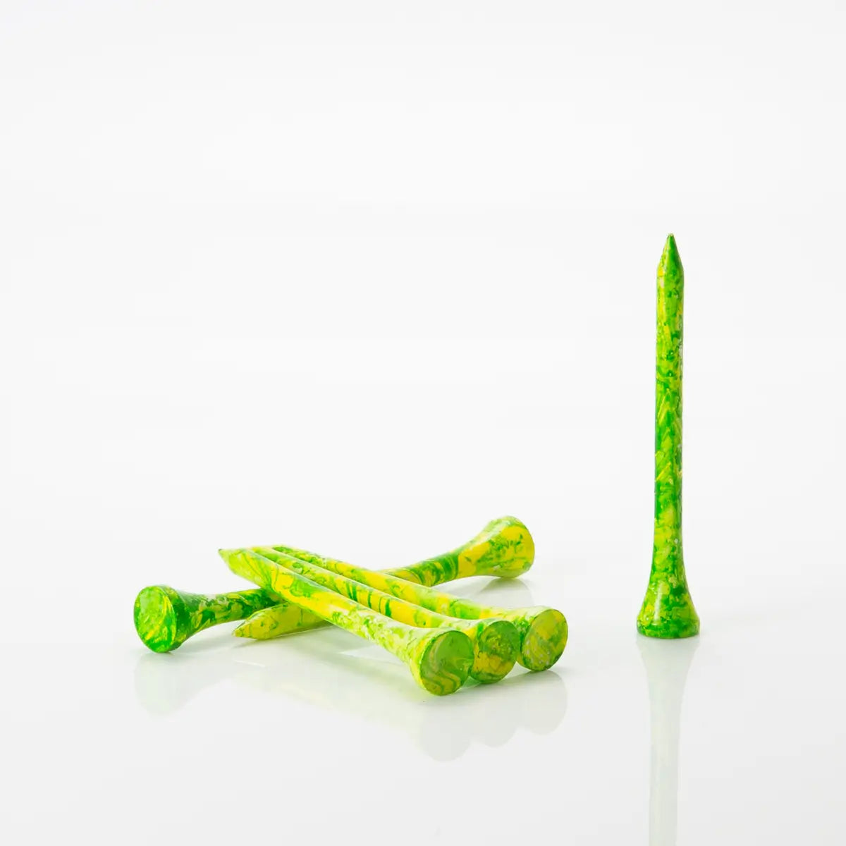 Six Green/Yellow tees laying by one another. 