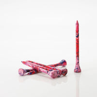 Six red/blue tees laying by one another. 