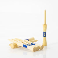 Six 3-1/4" Professional Tee System Tees laying by one another.