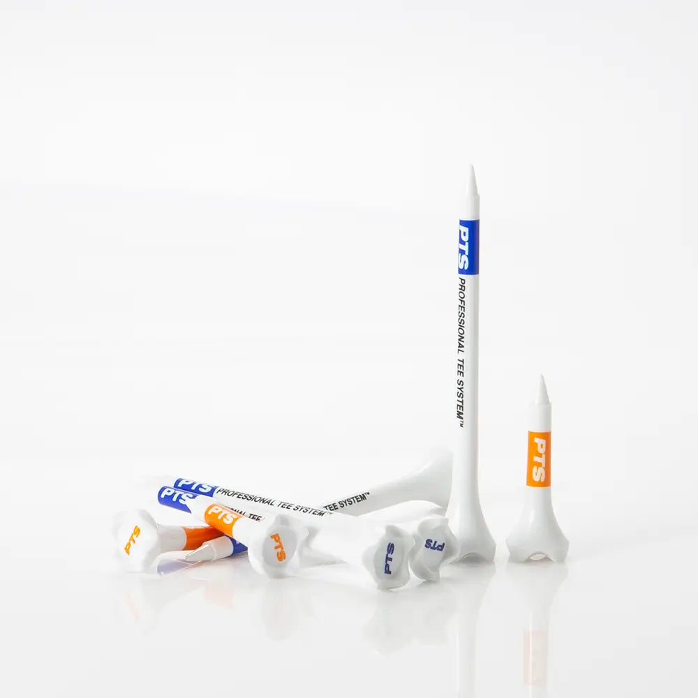 Set of golf tees with visible branding on a white background