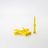 Yellow golf tees on a white background
