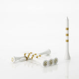 White golf tees with gold stripes and dollar signs on a white background