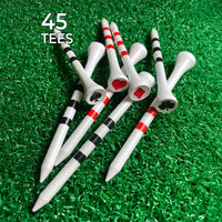 Set of golf tees with playing card suits on a green grass background
