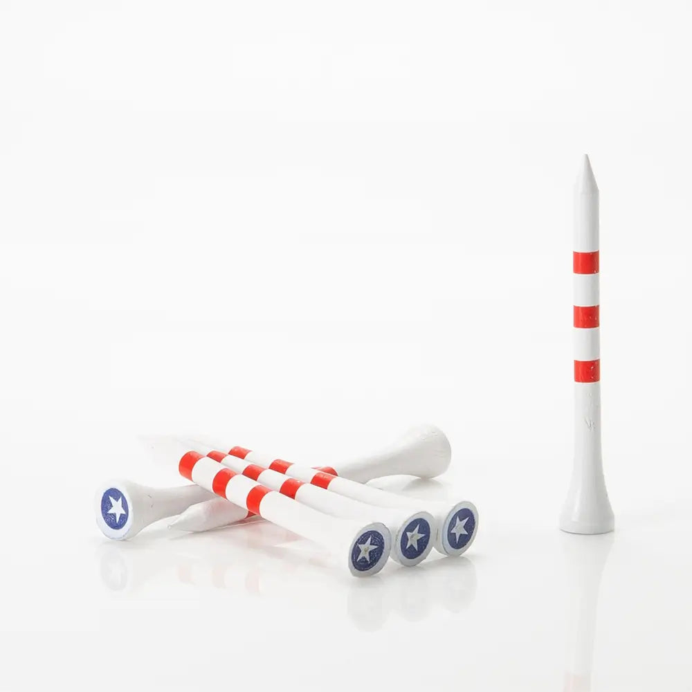 White golf tees with red stripes and a blue star print on a white background