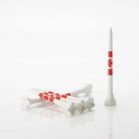 Red and white golf tees on a white background