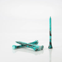 Six Turquoise/Black tees laying by one another. 