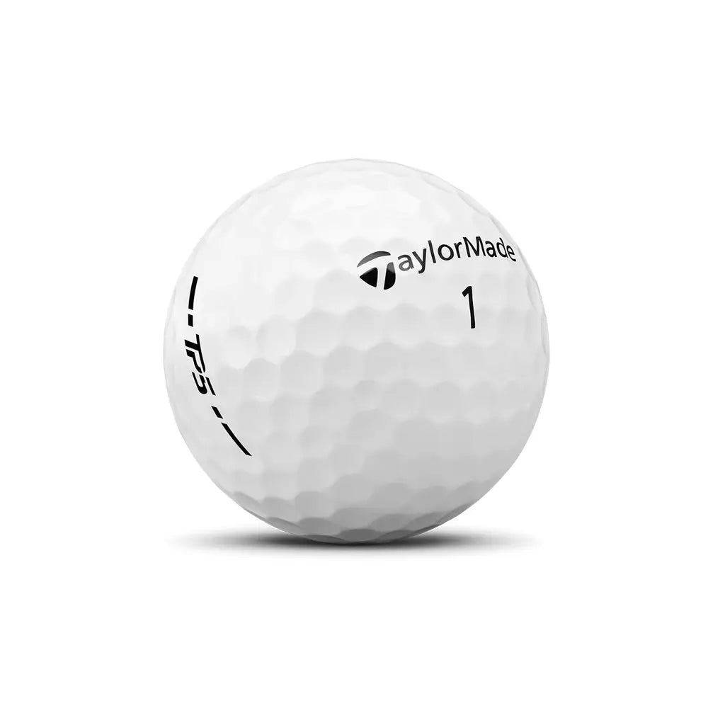 White golf ball with TaylorMade branding on a white background