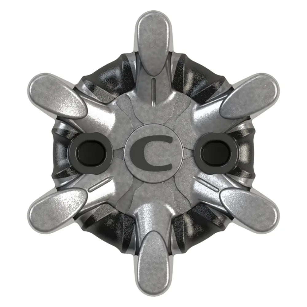 Bottom view of replaceable golf spike on a white background