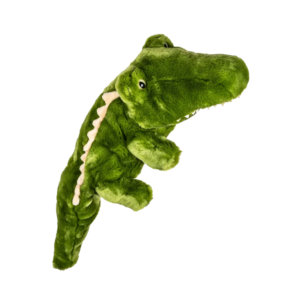 A green plush crocodile golf cover with detailed texture, featuring friendly eyes and open mouth.