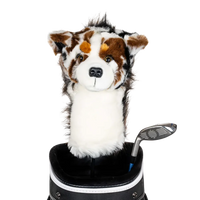 A plush dog headcover peeks out from a golf bag, featuring a fluffy design with brown and white markings.