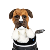 A plush dog headcover peeks out from a golf bag, featuring a fluffy design with brown and white markings.