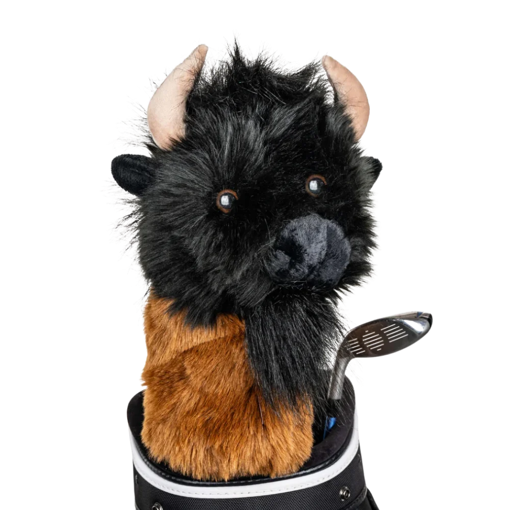 A buffalo-shaped golf club head cover sitting in a golf bag, with a club peeking out.