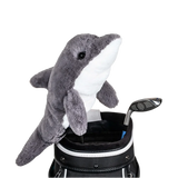A dolphin-shaped golf club head cover sitting in a golf bag, with a club peeking out.