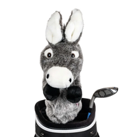 A donkey-shaped golf club head cover sitting in a golf bag, with a club peeking out.
