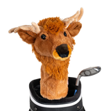 An elk-shaped golf club head cover sitting in a golf bag, with a club peeking out.